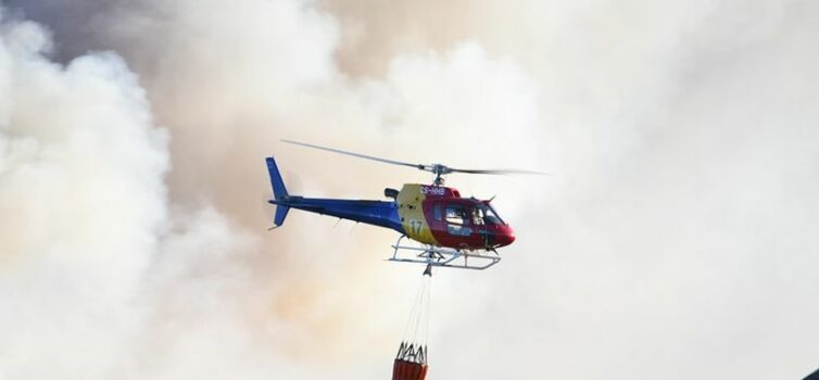 Dois meios aéreos combatem incêndio na Guarda