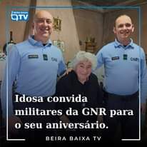 May be an image of 3 people and text that says 'BEIRA BAIXA QTV SARANGK GNR GNR Idosa convida militares da GNR para o seu aniversário. BEIRA BAIXA TV'